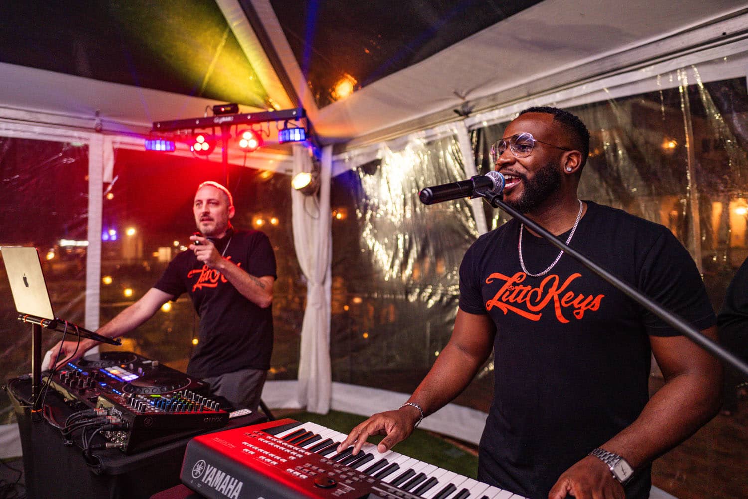 Two DJs playing at a party inside The Historic Cavalier Hotel