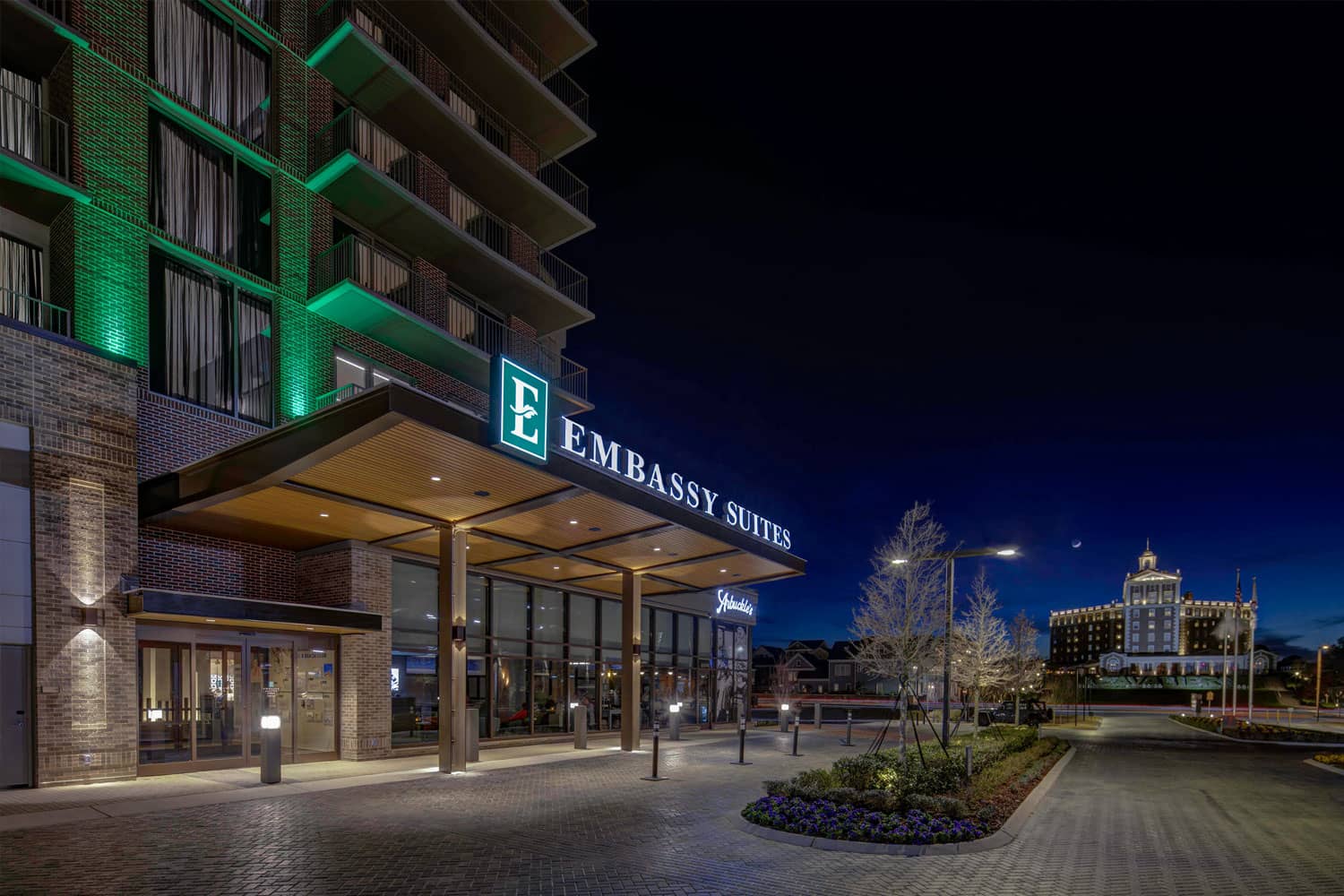 The entrance to the Embassy Suites Virginia Beach Oceanfront Resort at night