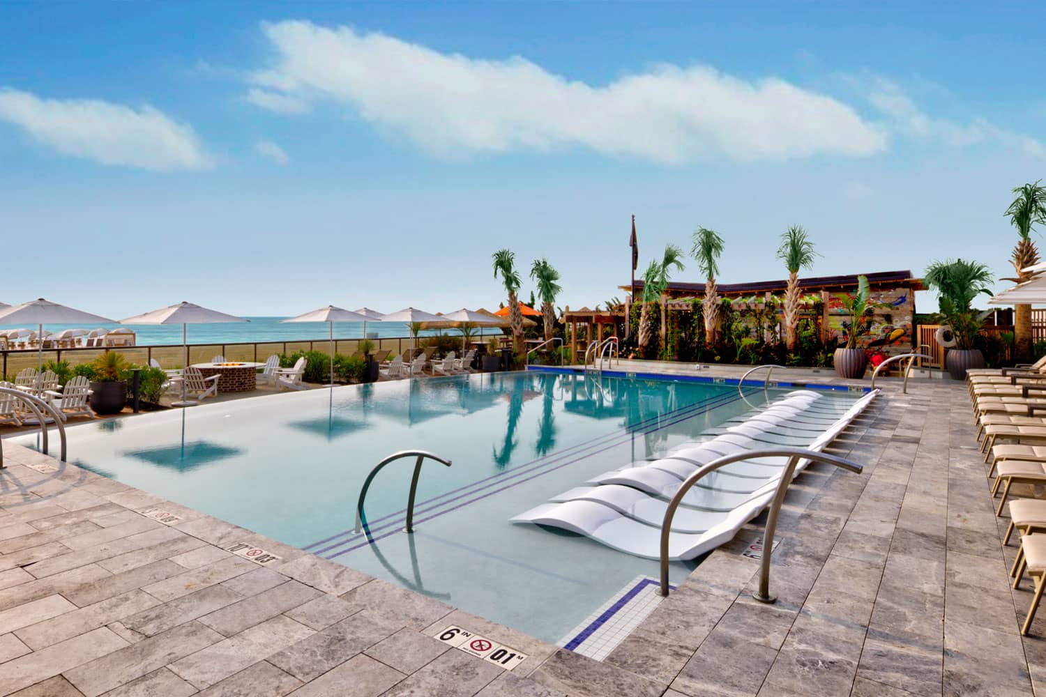 The outdoor infinity pool at the Embassy Suites Virginia Beach Oceanfront Resort