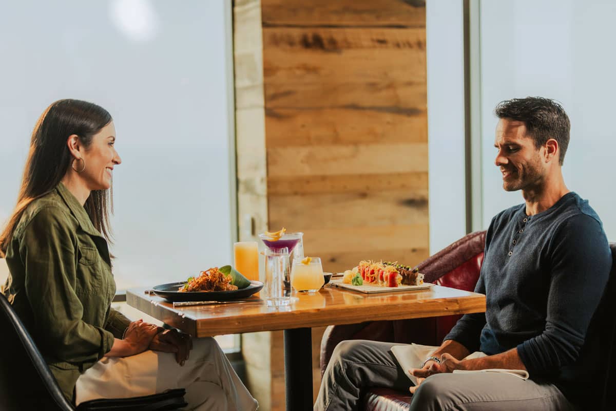 A couple dining in Orion's Roof