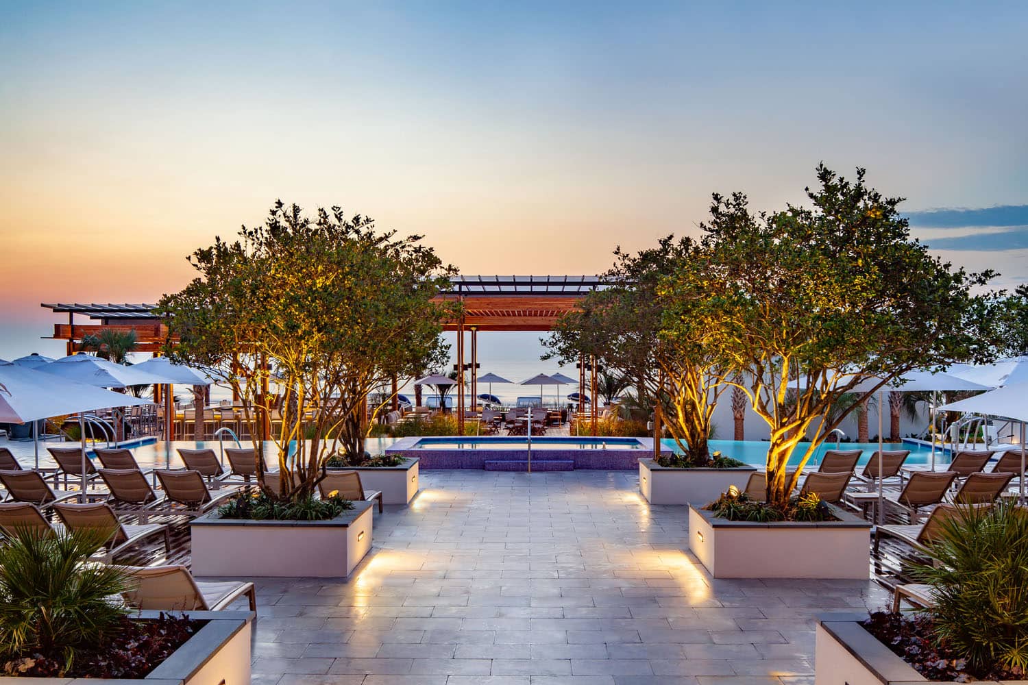 The Cavalier Beach Club exterior at night