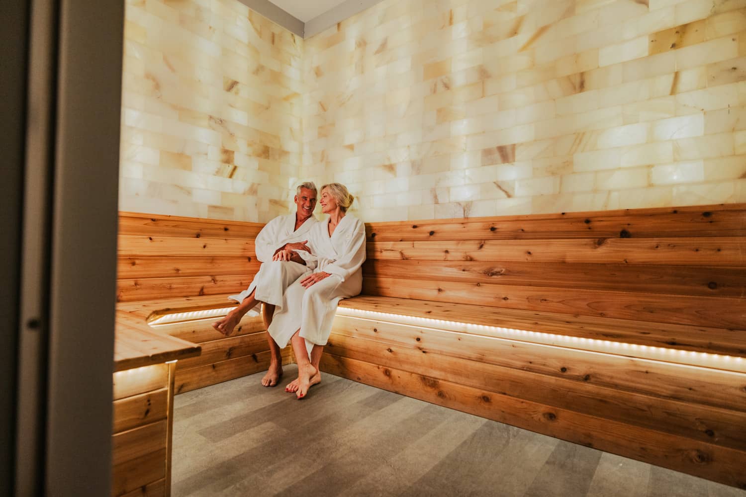 A couple enjoying the sauna at the SeaHill Spa