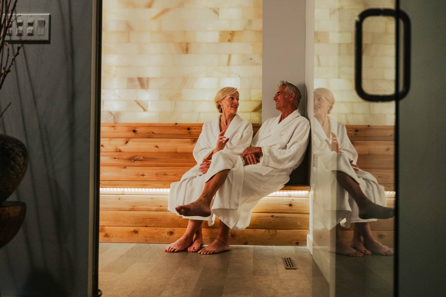 A couple enjoying the sauna at the SeaHill Spa