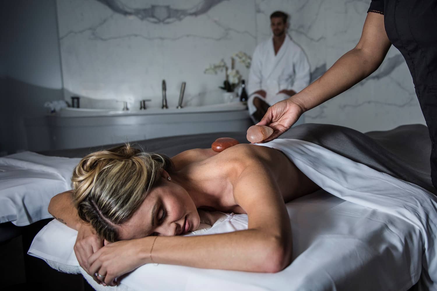 A couple receiving a massage at the SeaHill Spa