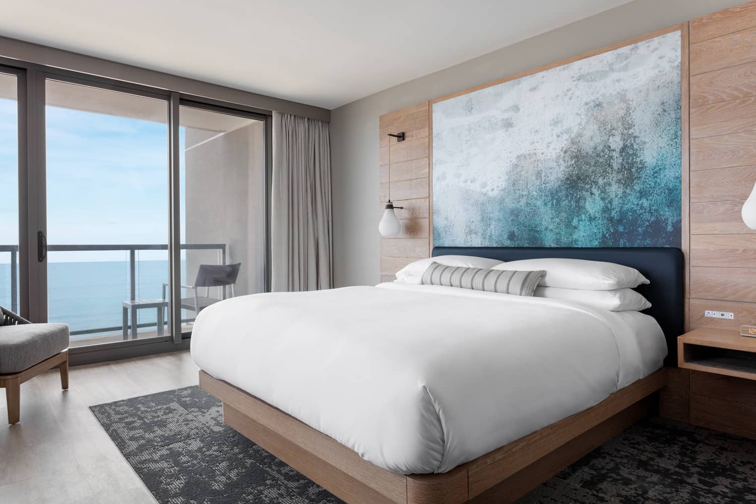 A panoramic king guest room inside the Marriott Virginia Beach Oceanfront Resort