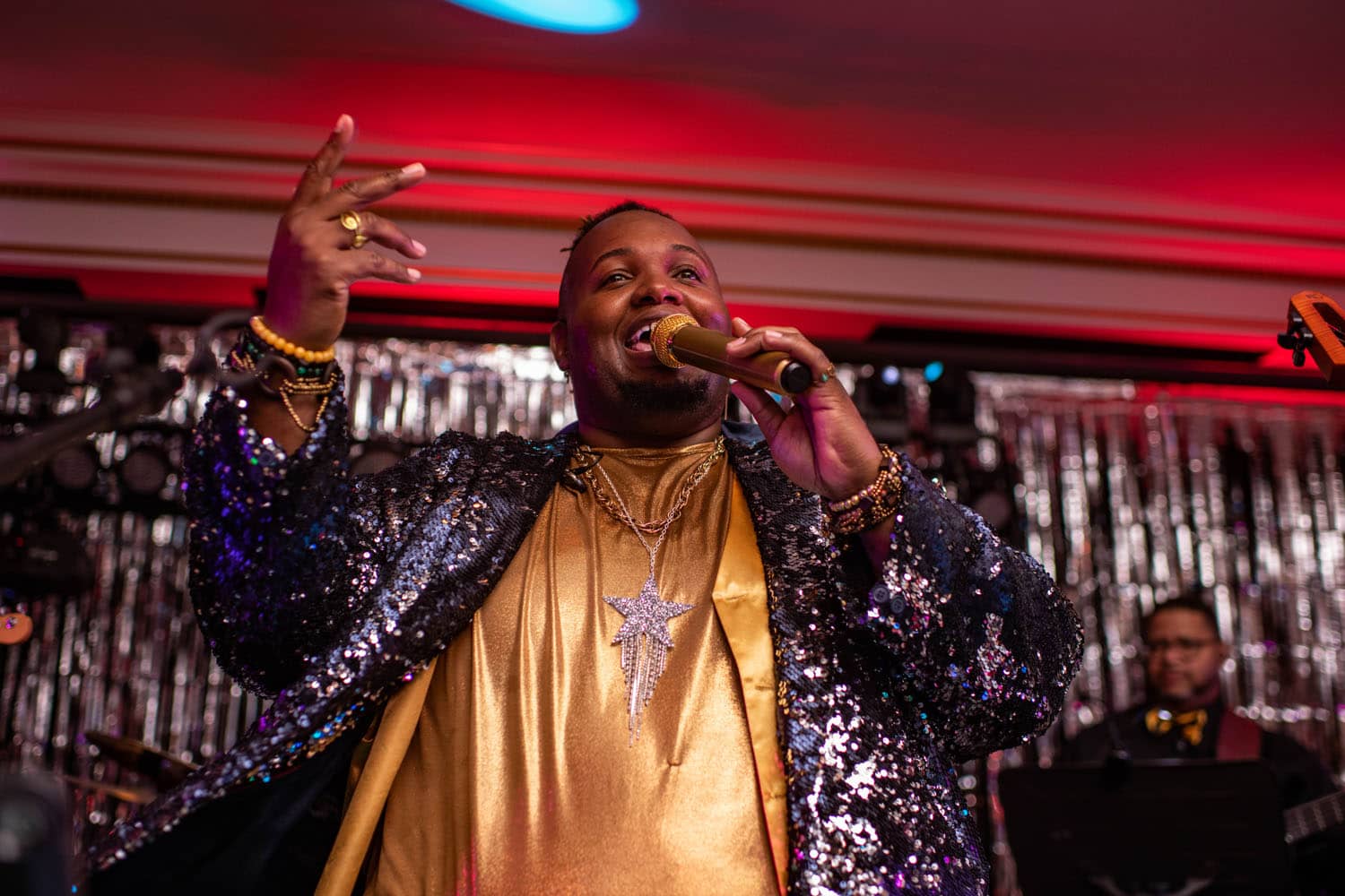 BJ Griffin performing live music on a stage