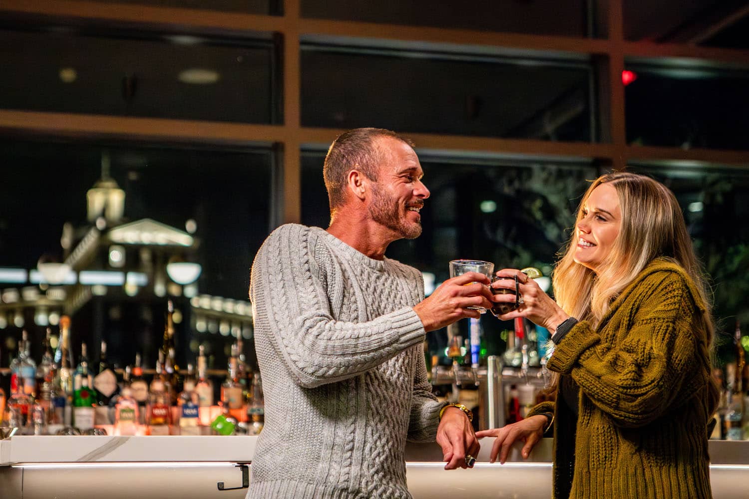 Two people having drinks at Arbuckle's Bar & Grill