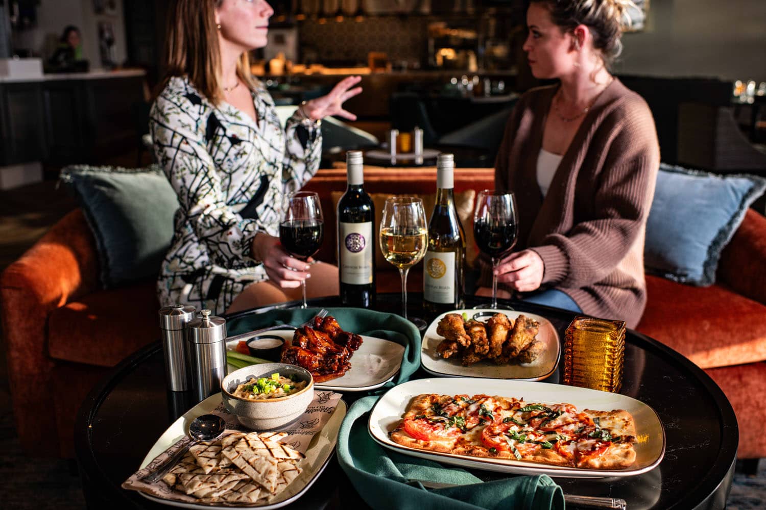 A variety of food and drinks on a table at Arbuckle's Bar & Grill