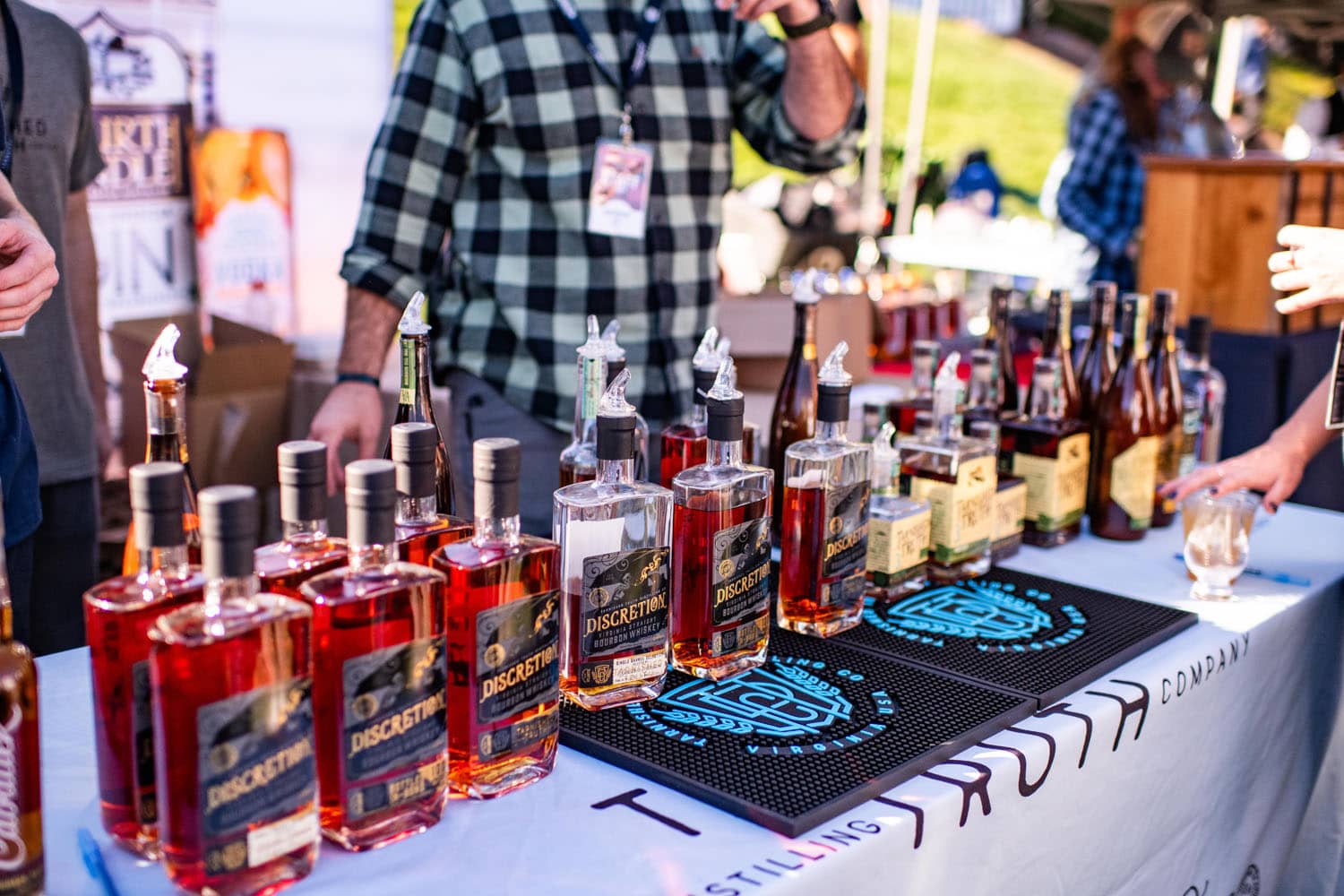 A table of Tarnished Truth Distilling Company bourbon and whiskey