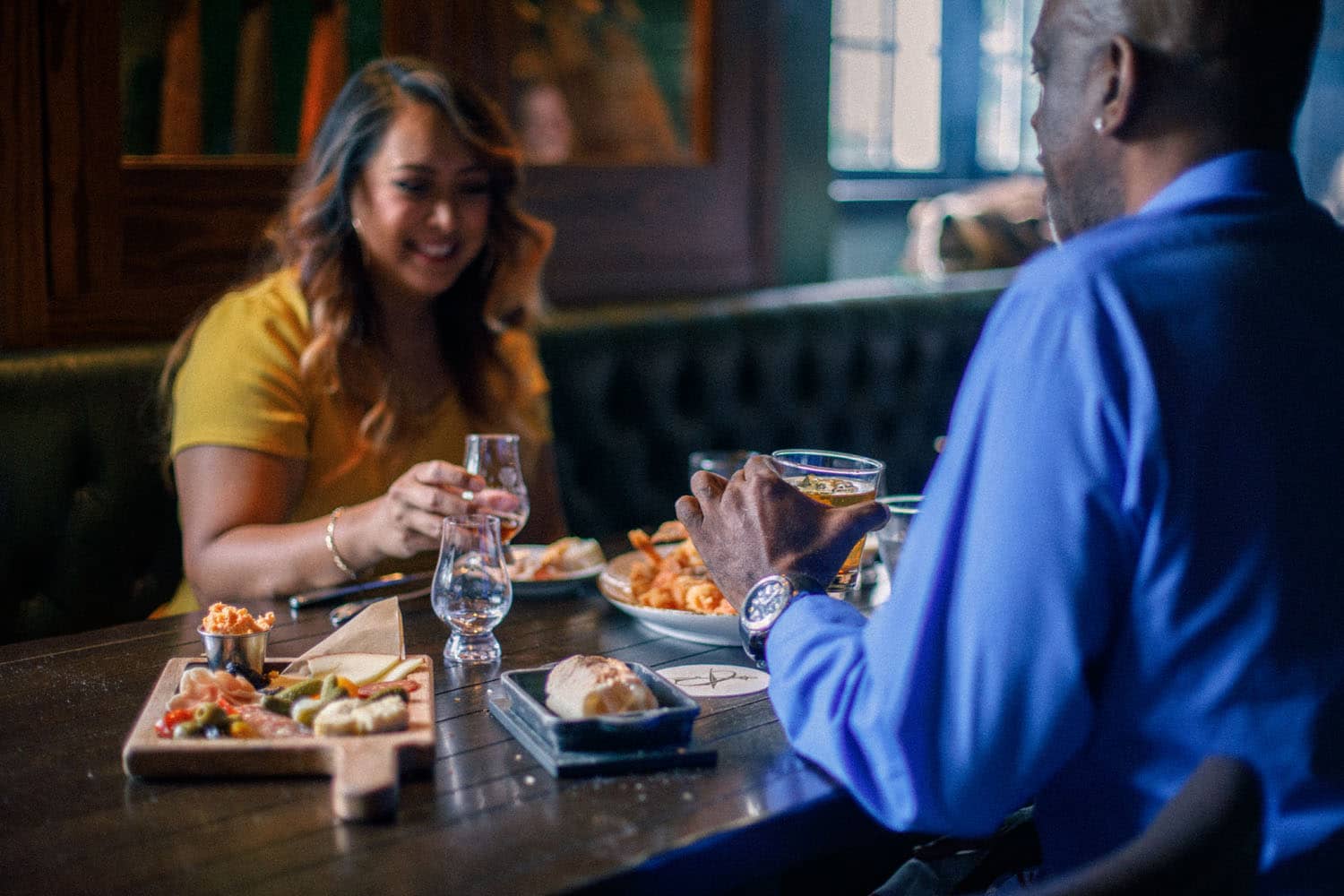 A couple enjoying a meal inside the Hunt Room