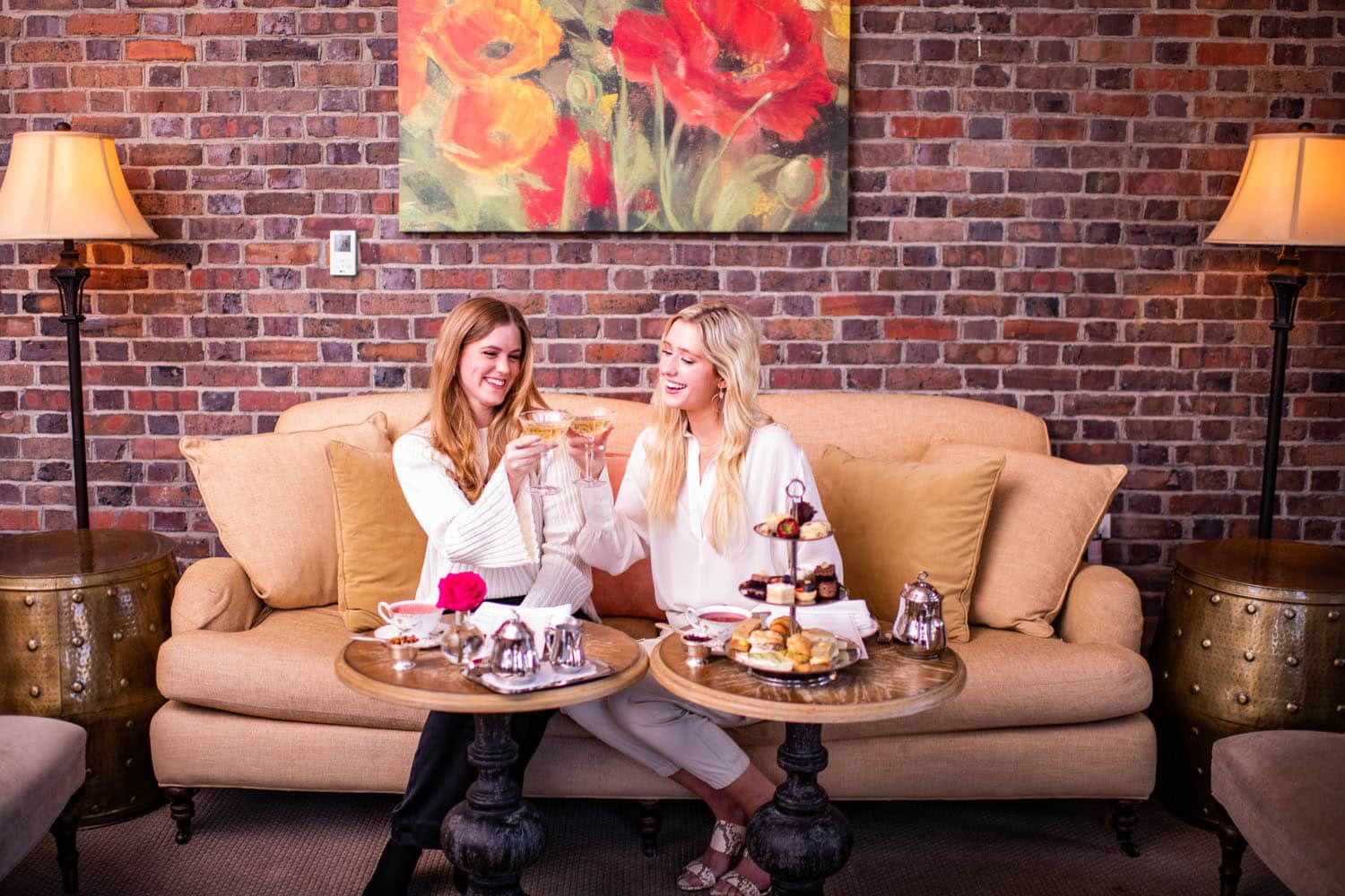 Two women enjoying afternoon tea in The Raleigh Room