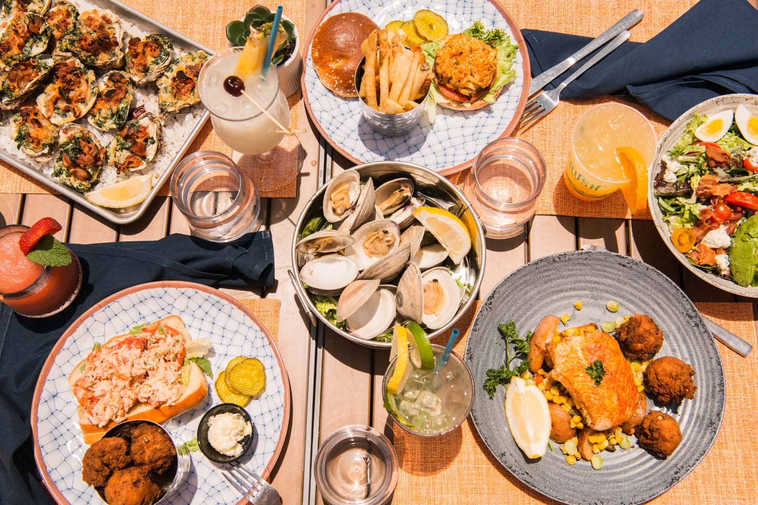 A platter of fresh seafood spread out on a table