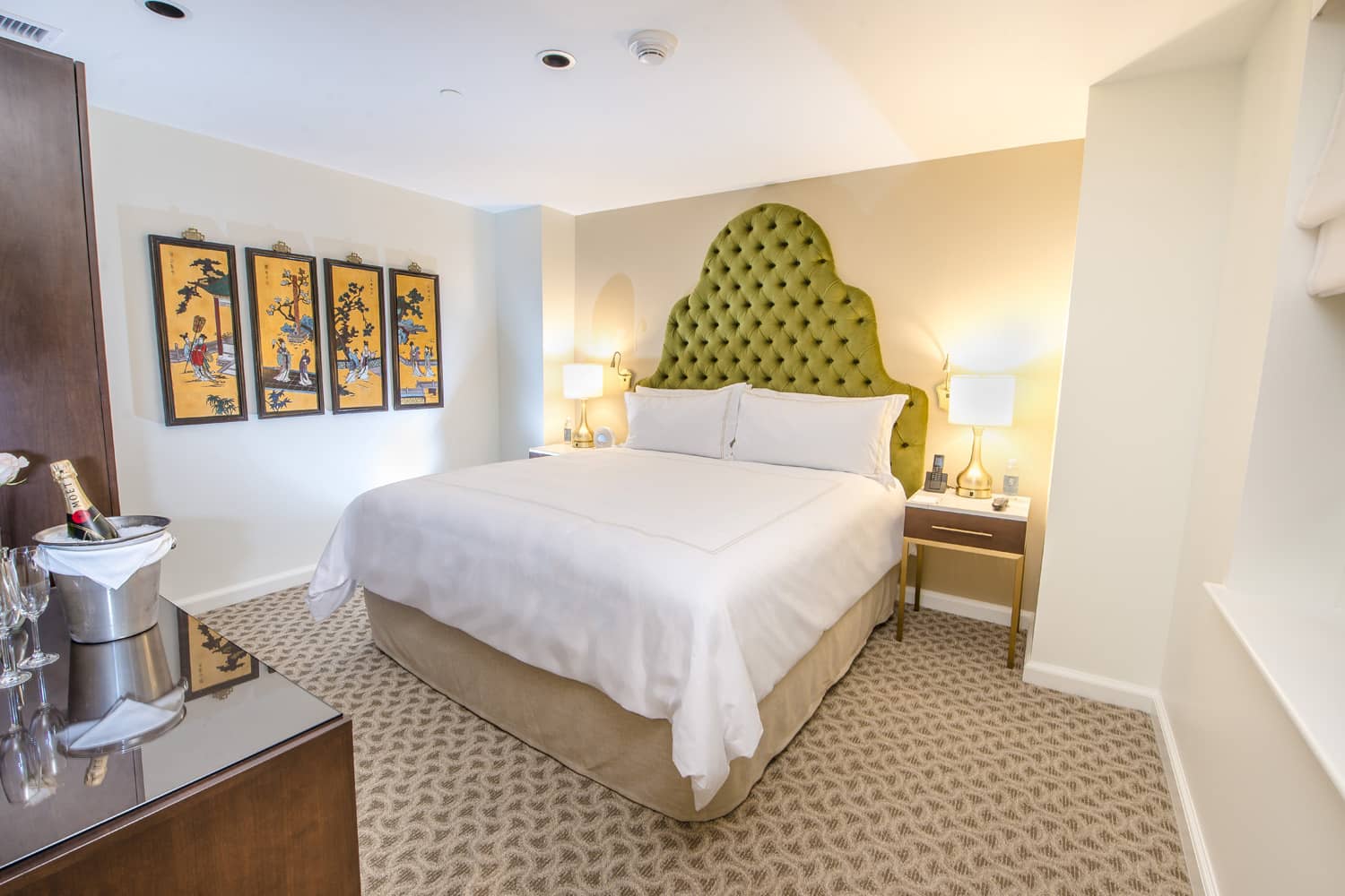 The interior bedroom of The Reidy Suite at The Historic Cavalier Hotel