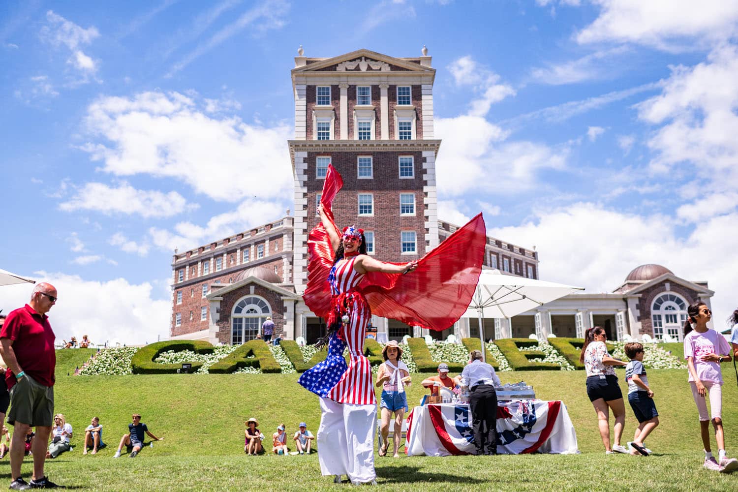 An entertainer on the lawn at The Historic Cavalier Hotel during a July 4th celebration