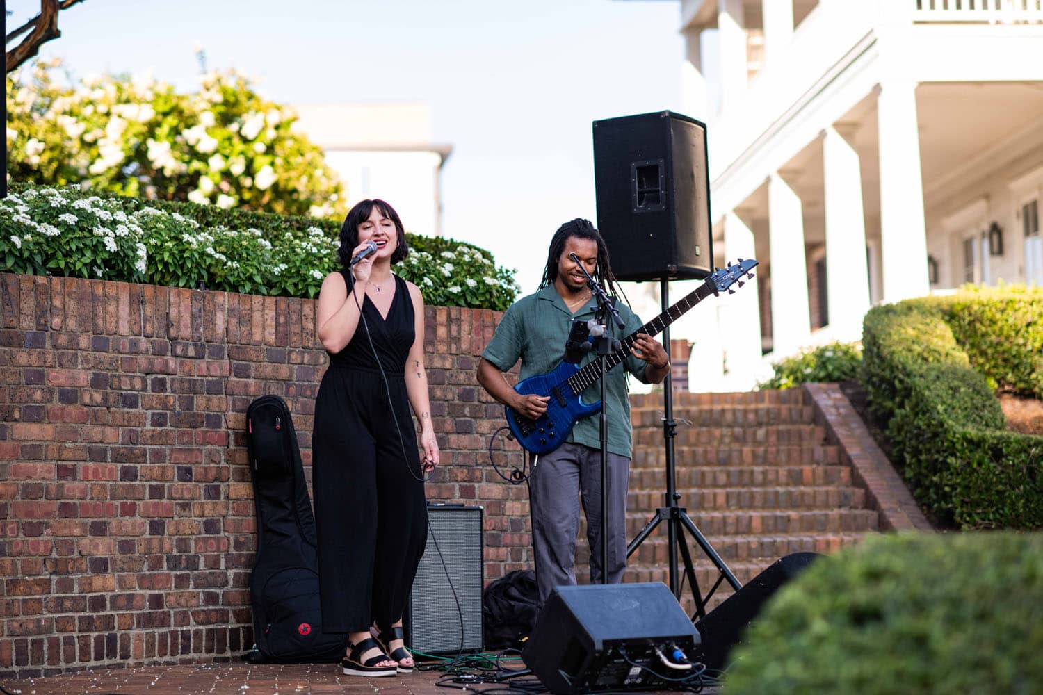 An artist performing live outside The Historic Cavalier Hotel
