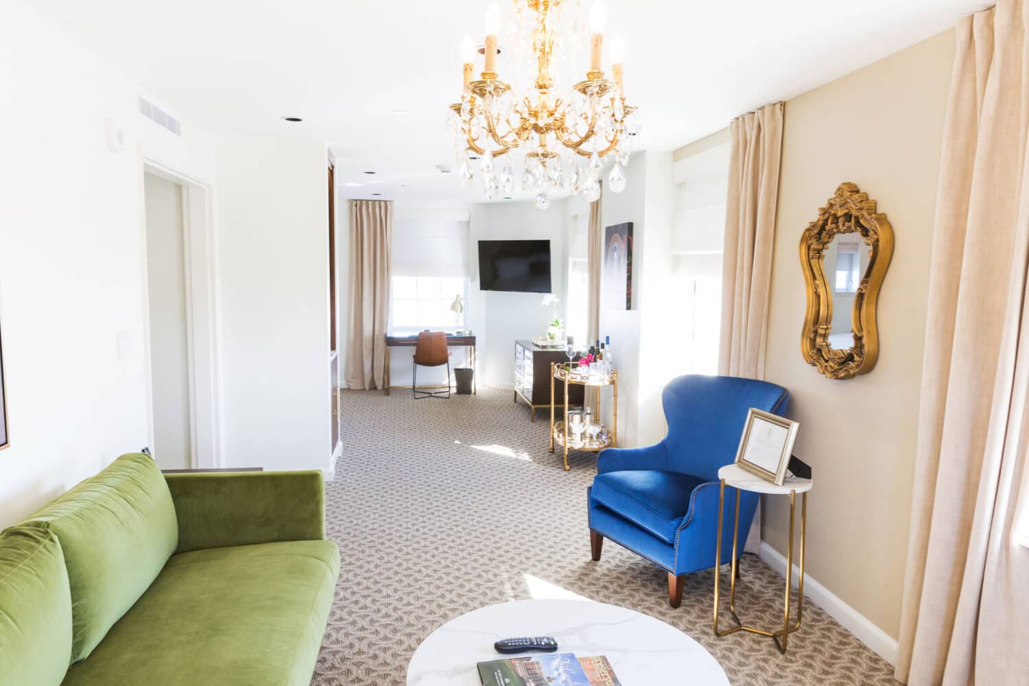 An interior Suite living room inside The Historic Cavalier Hotel