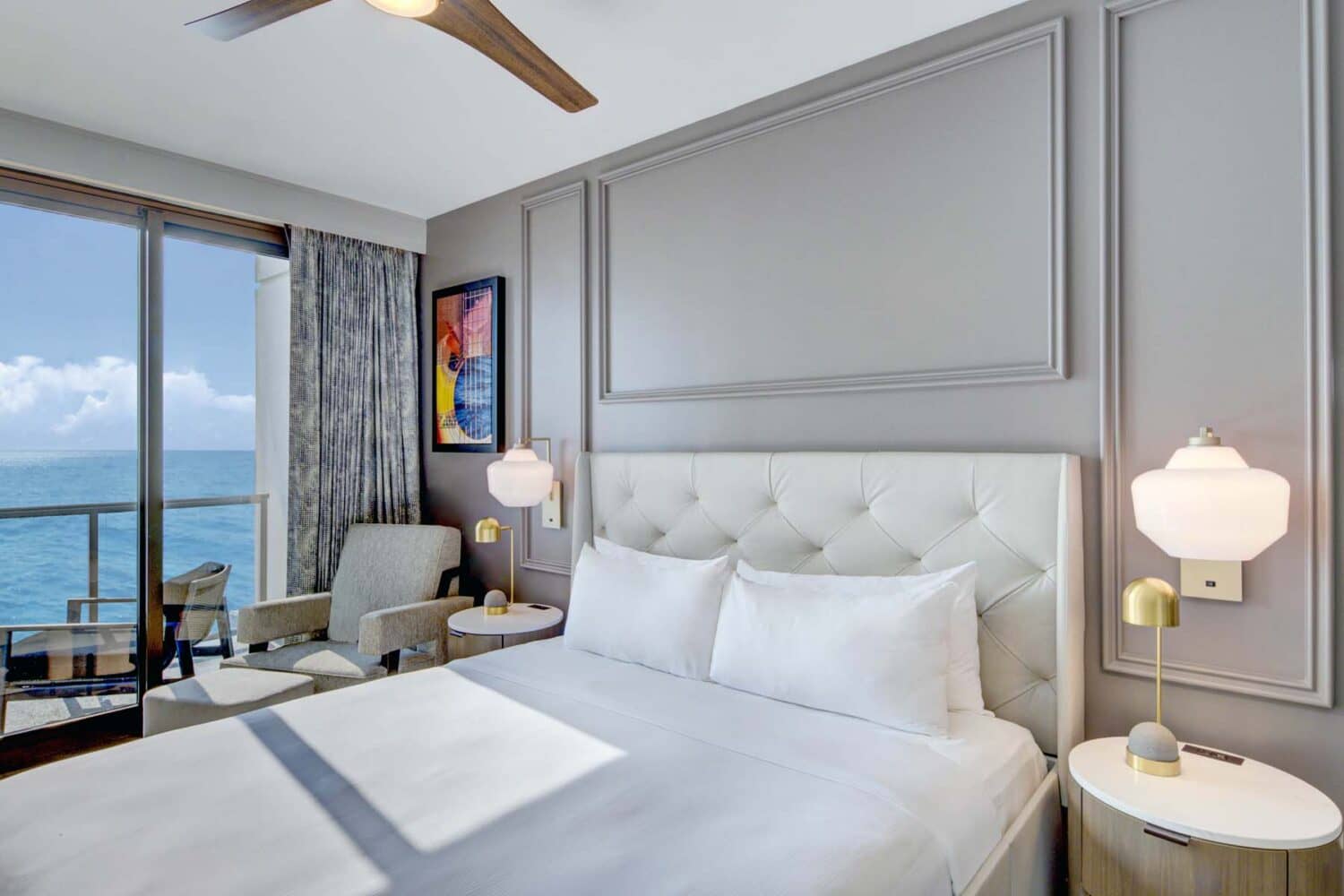 A bedroom suite inside the Embassy Suites Virginia Beach Oceanfront Resort