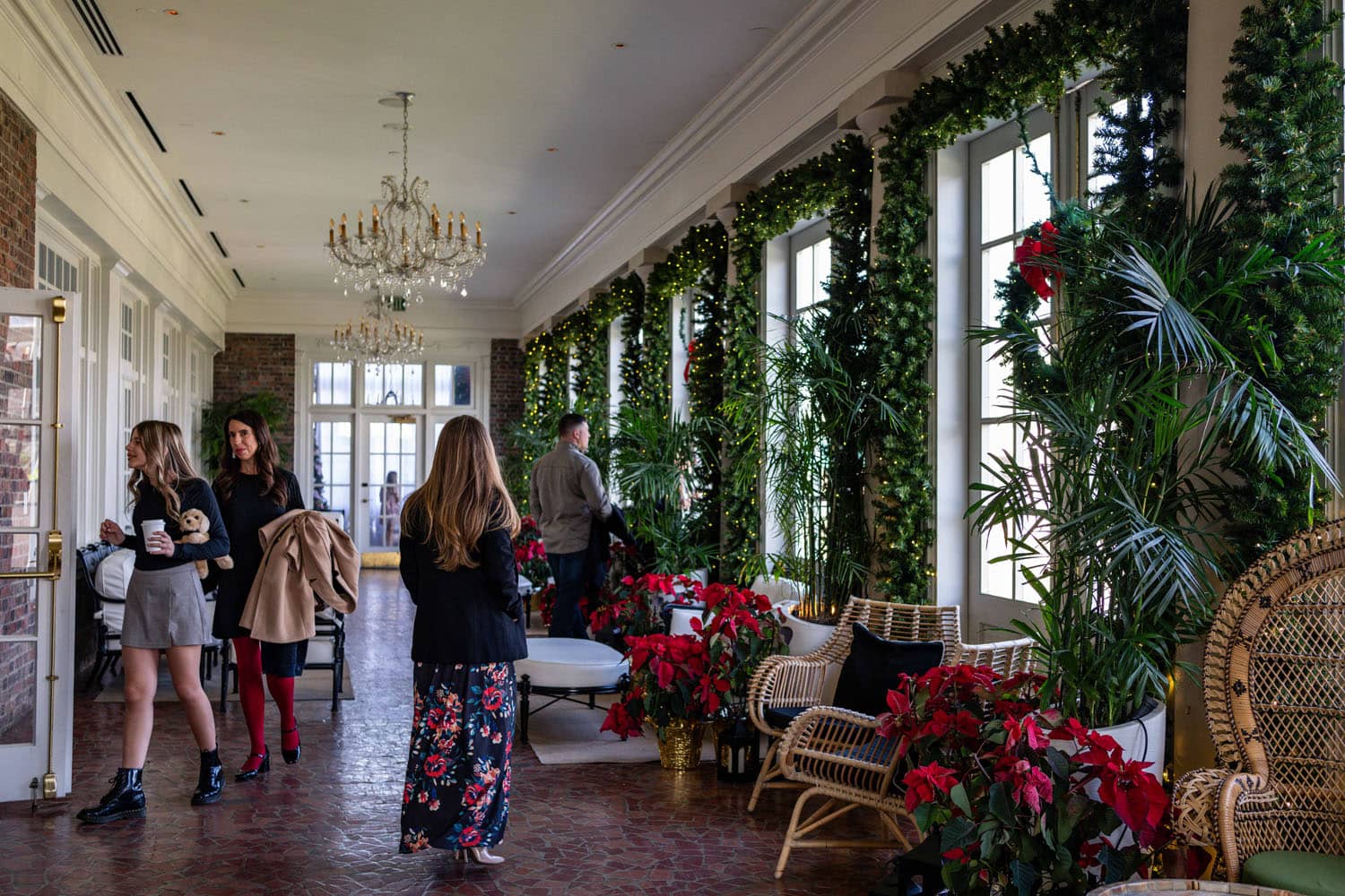An interior lobby decorated with holiday garland