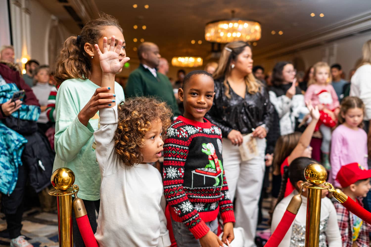 A group of children at a Santa show inside The Cavalier Hotel