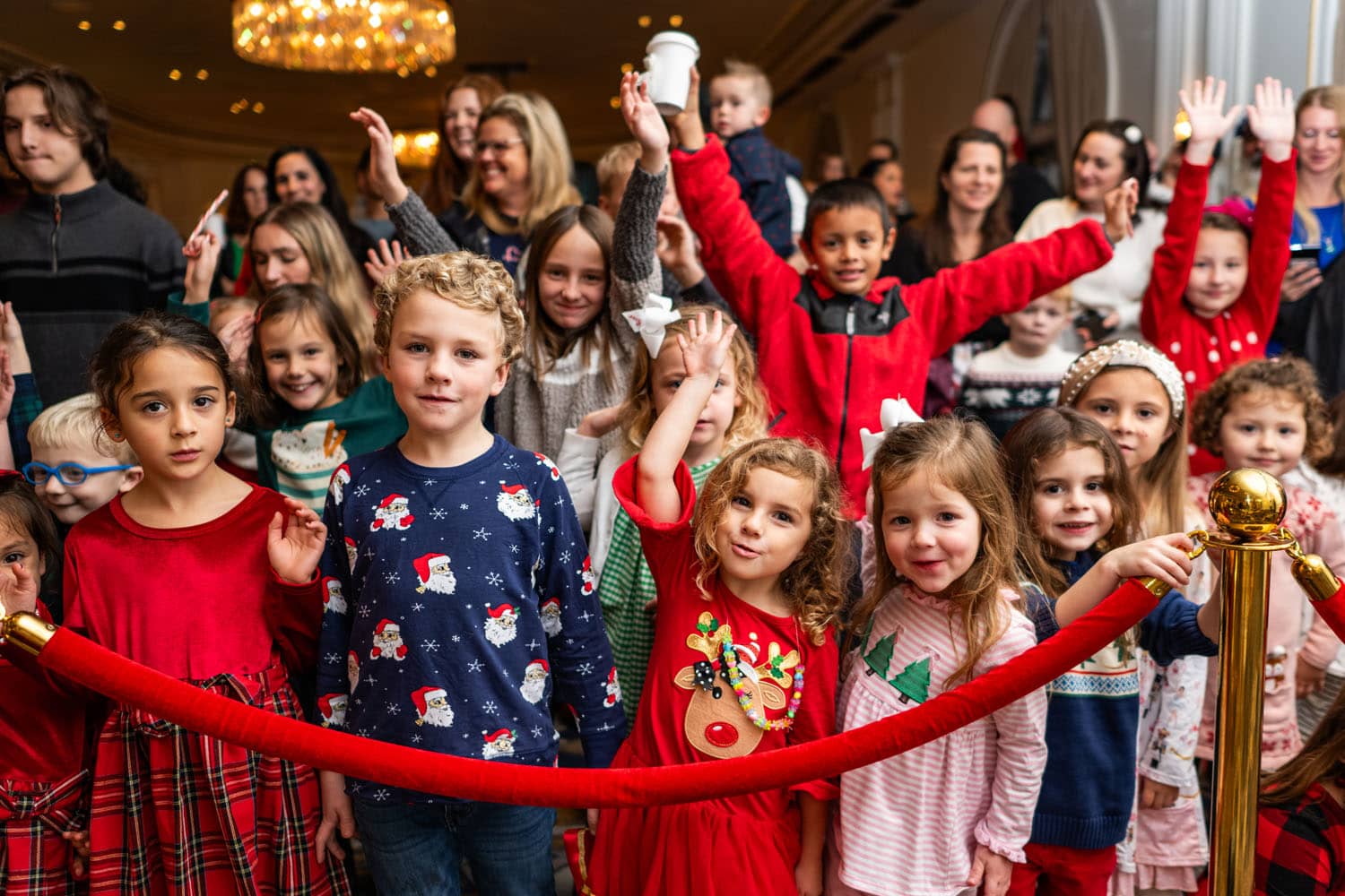 A group of children at a Santa show inside The Cavalier Hotel