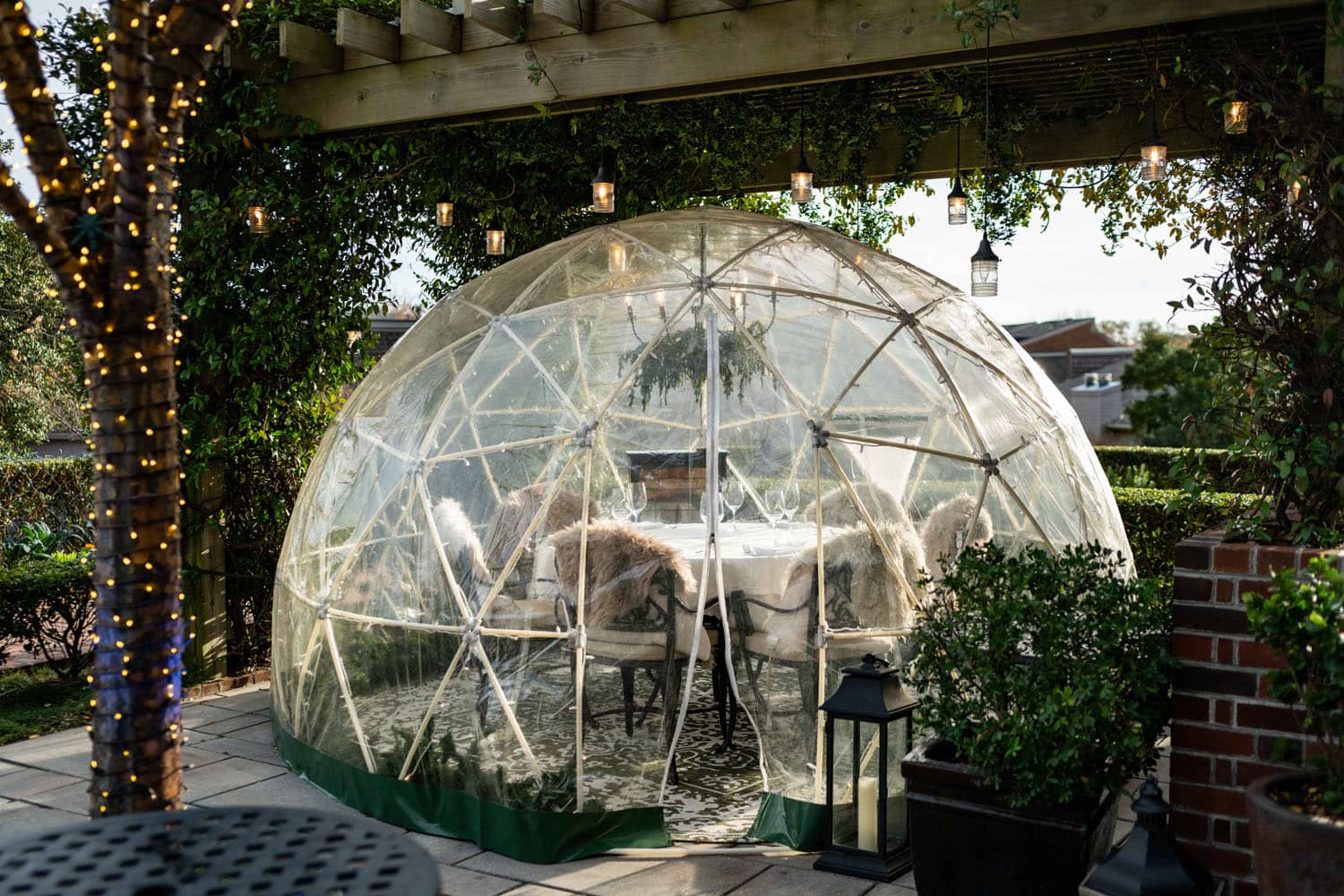 An outdoor heated igloo at Becca Restaurant & Garden