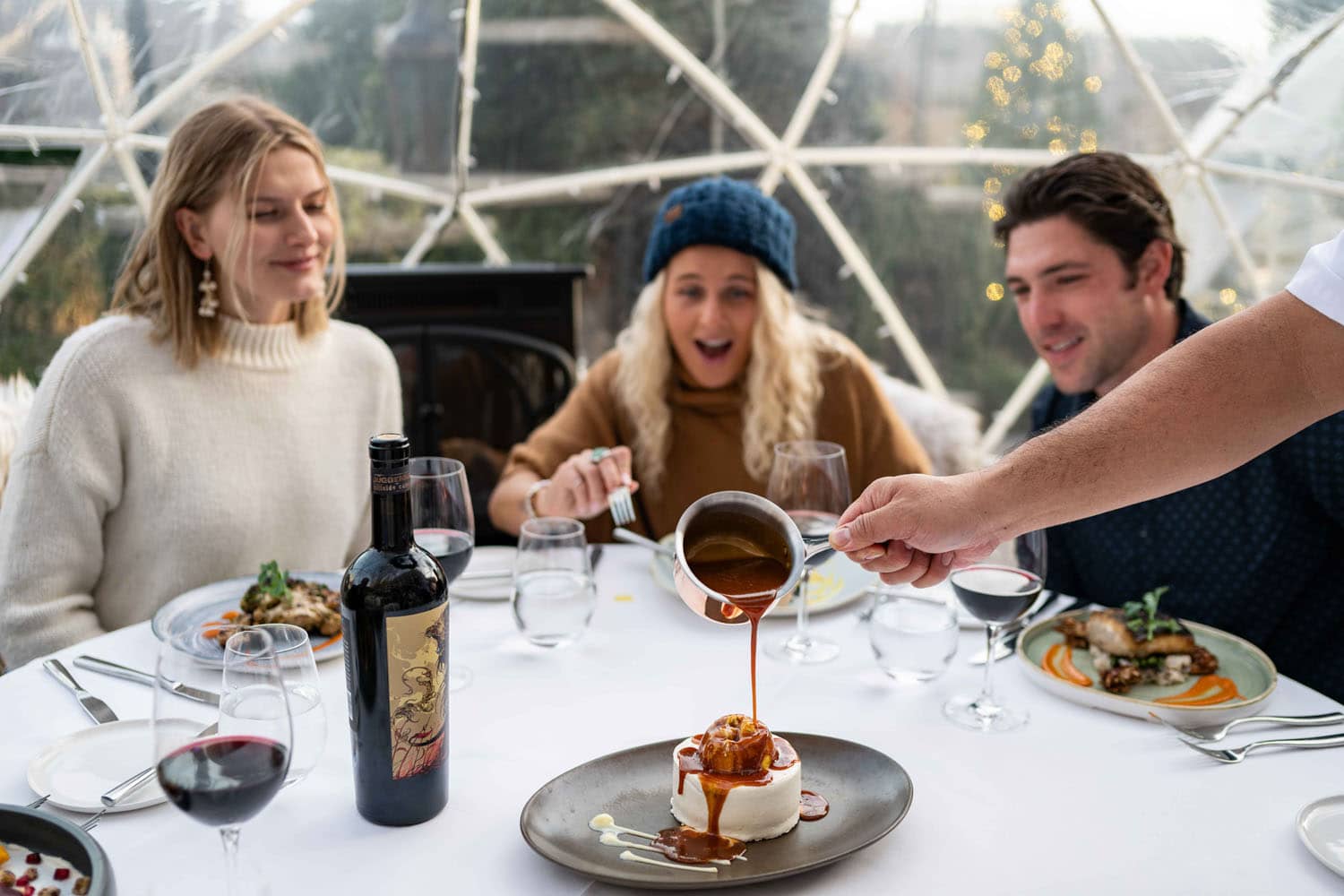 An outdoor heated igloo at Becca Restaurant & Garden