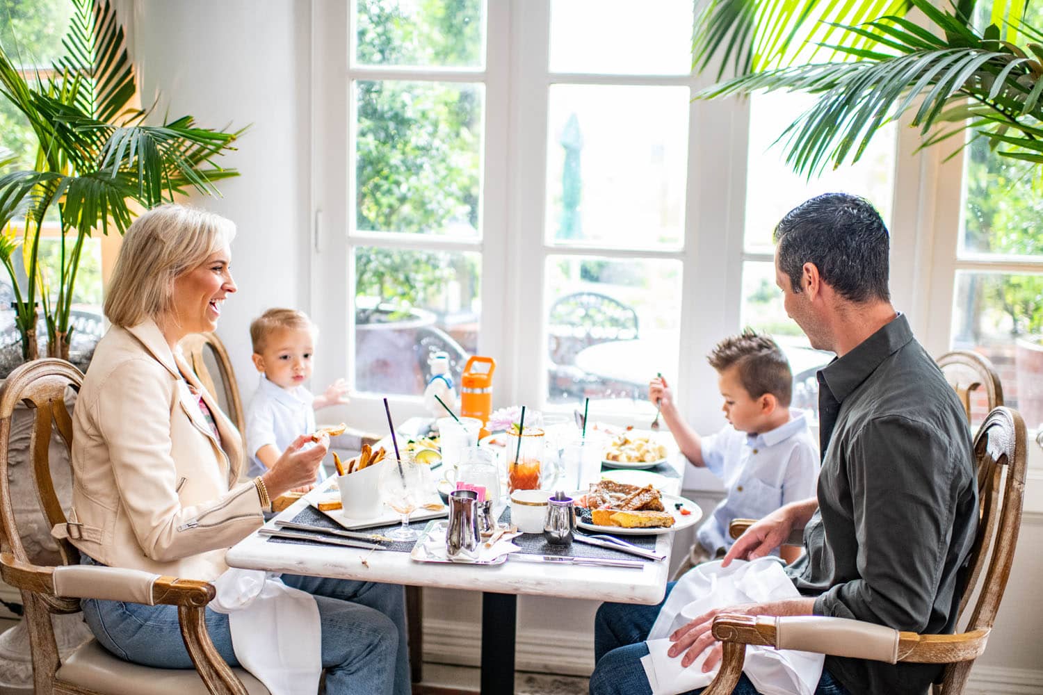 A family eating dinner during Mother's Day at Becca Restaurant & Garden