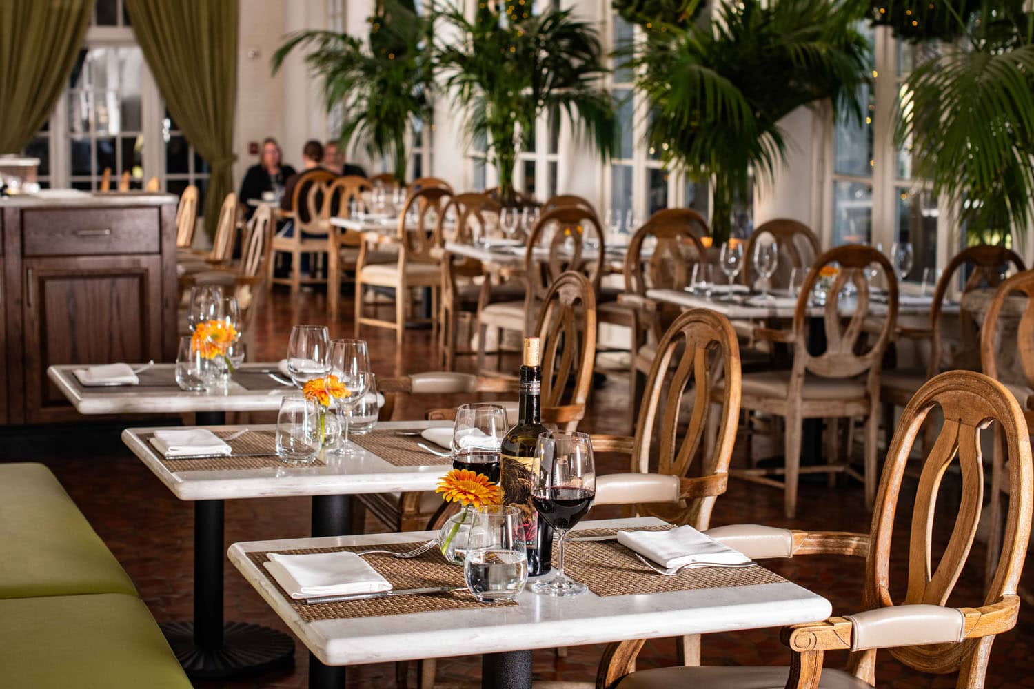 A table ready for dinner service at Becca Restaurant & Garden