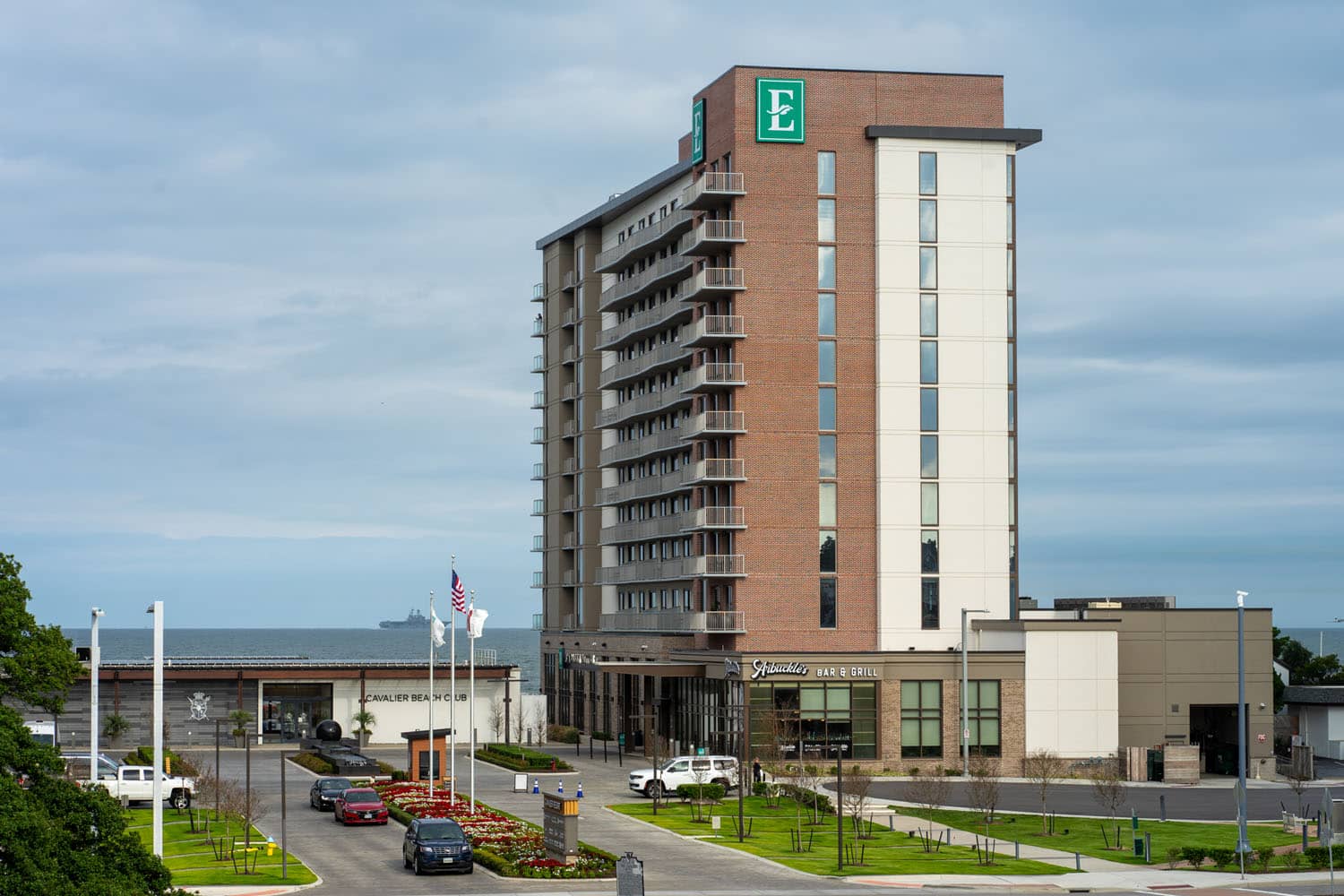 An exterior view of the Embassy Suites hotel at the Cavalier Resort