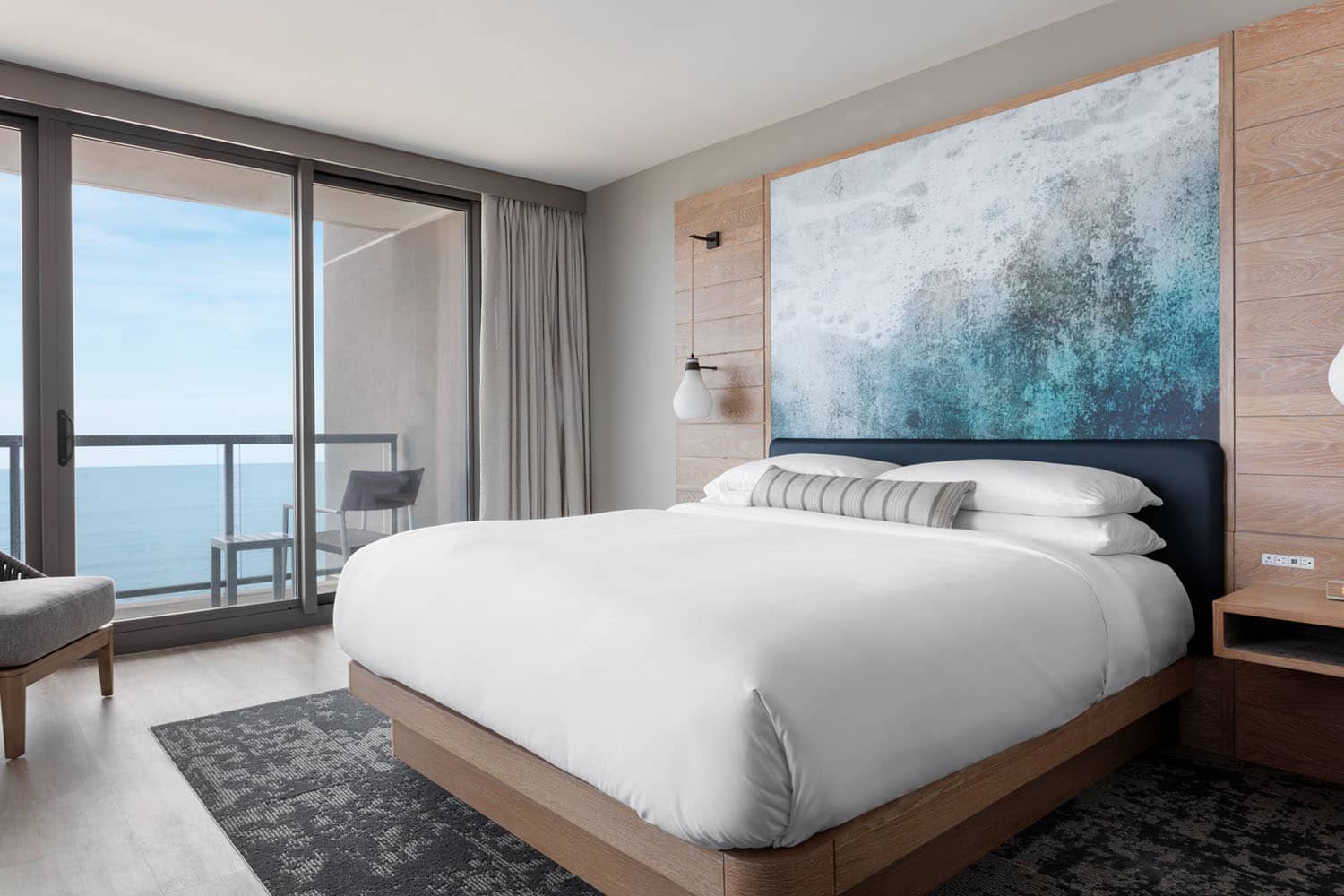An oceanfront king guest room inside the Marriott Virginia Beach Oceanfront Resort