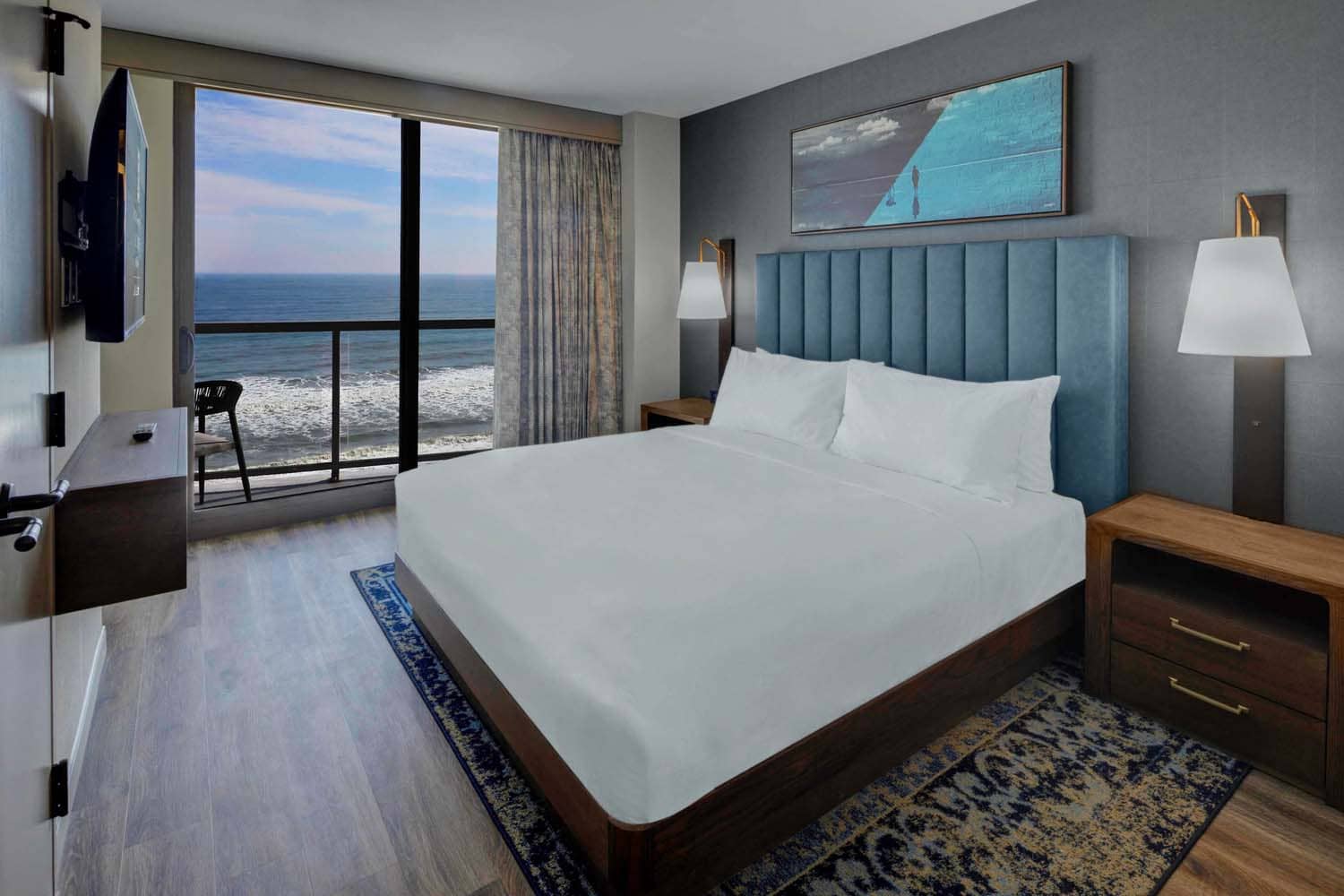 A king bedroom suite with oceanfront views at the Embassy Suites by Hilton Virginia Beach Oceanfront Resort