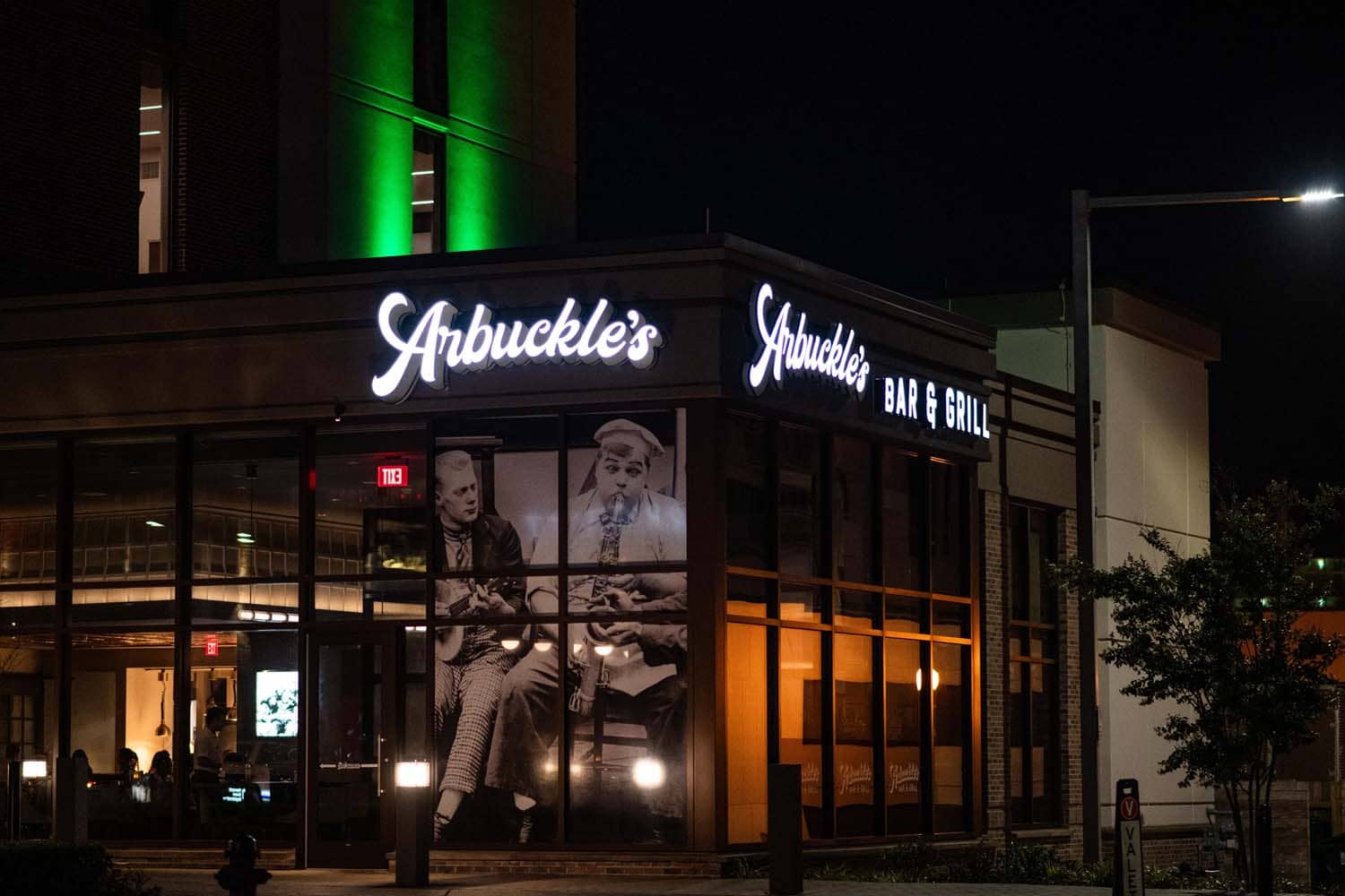 The exterior of Arbuckle's Bar & Grill at night