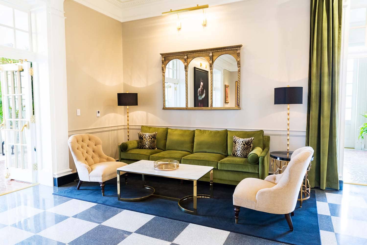 The interior lounge with artwork inside The Raleigh Room