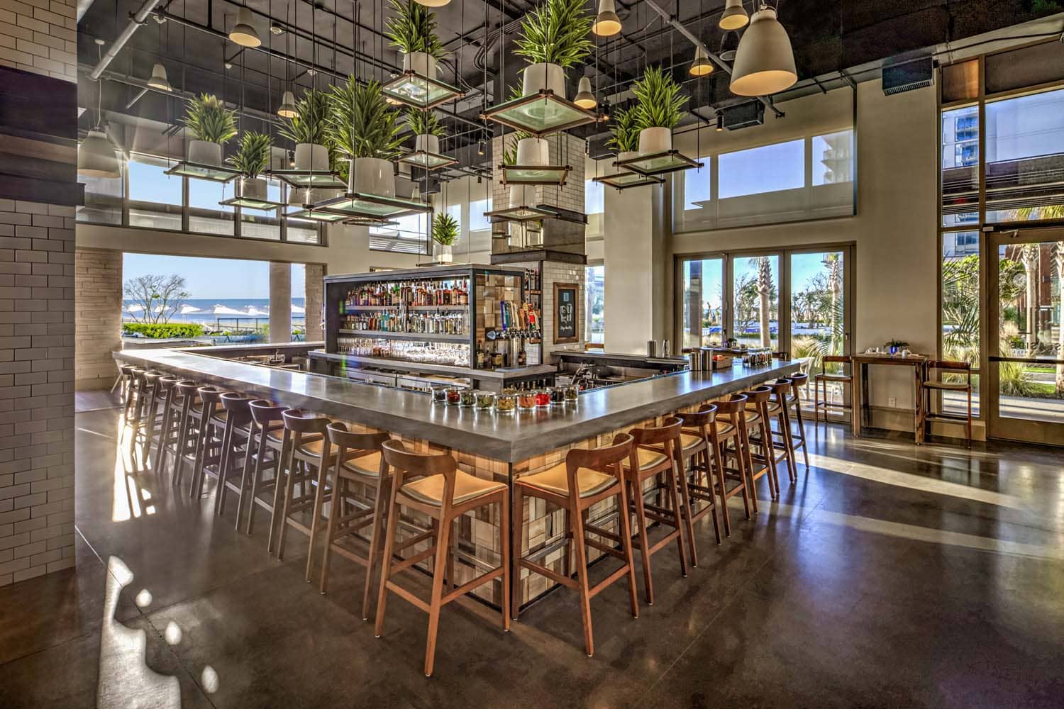The interior bar and dining area inside Tulu Seaside Bar & Grill