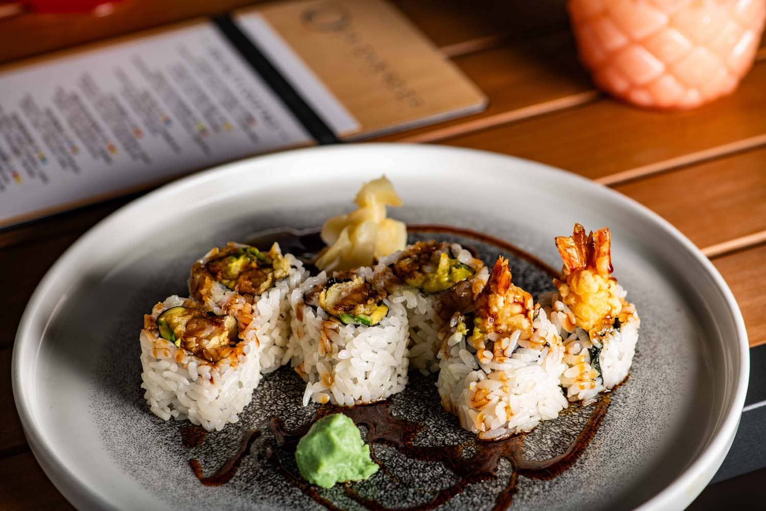 A close-up view of plated sushi on a table at Orion's Roof