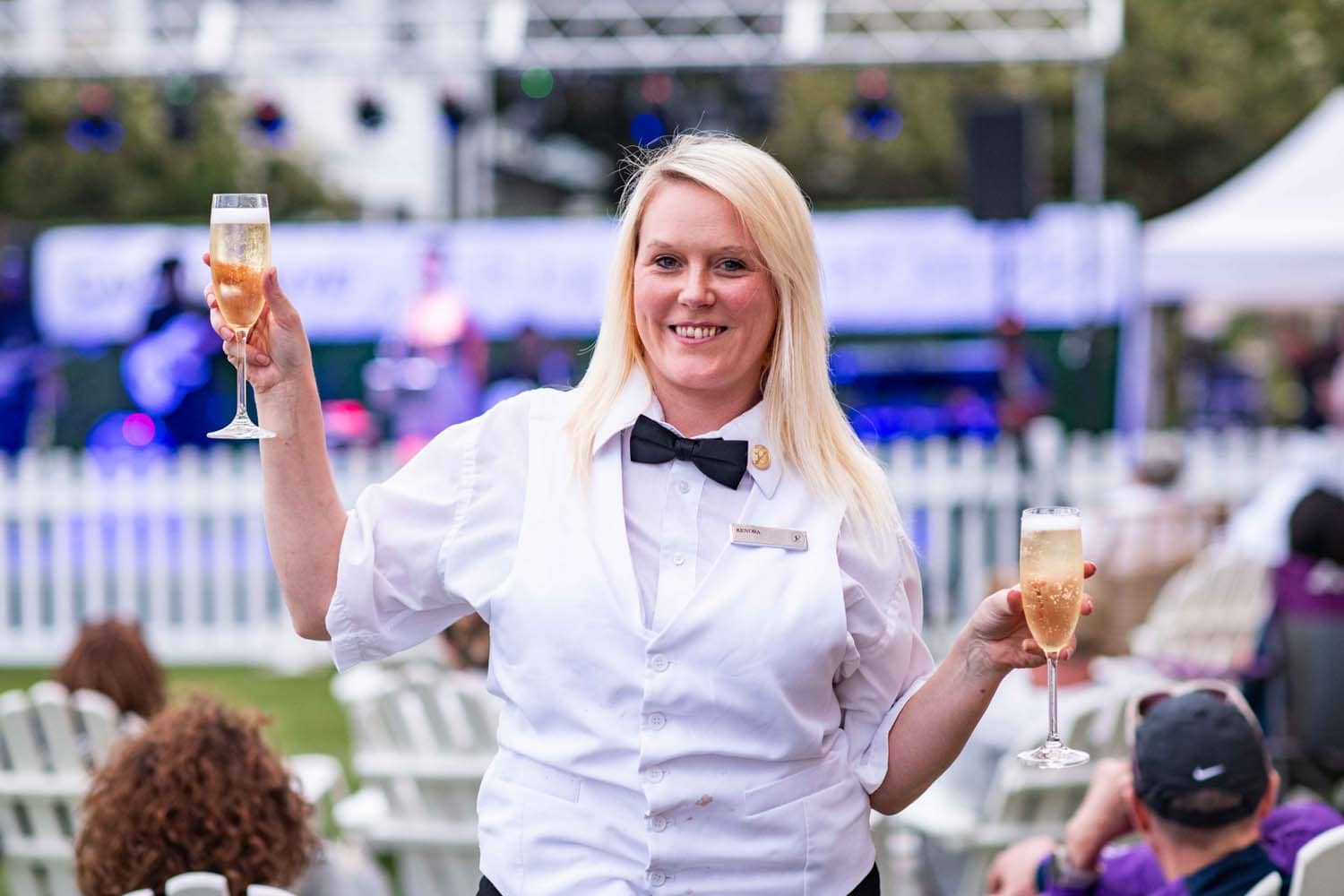 A bartender serving champagne at The Historic Cavalier Hotel