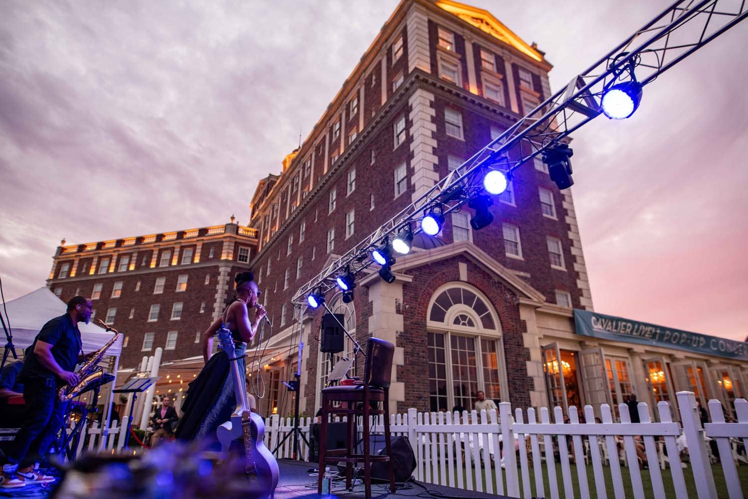 A live summer outdoor concert outside The Historic Cavalier Hotel