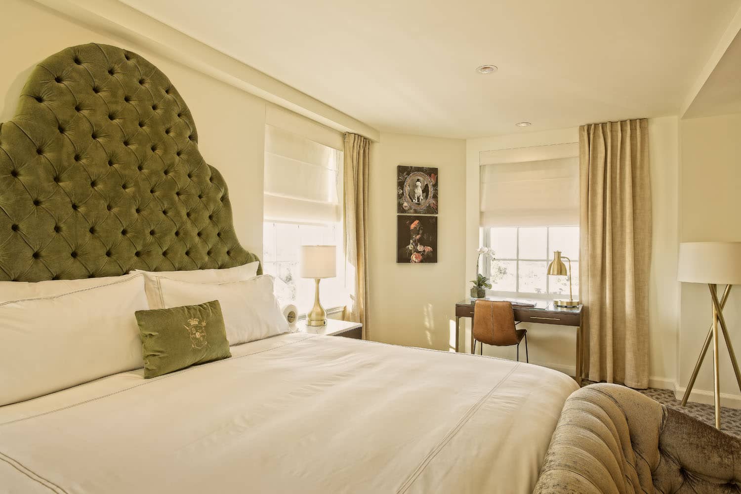 An interior king bedroom inside The Historic Cavalier Hotel