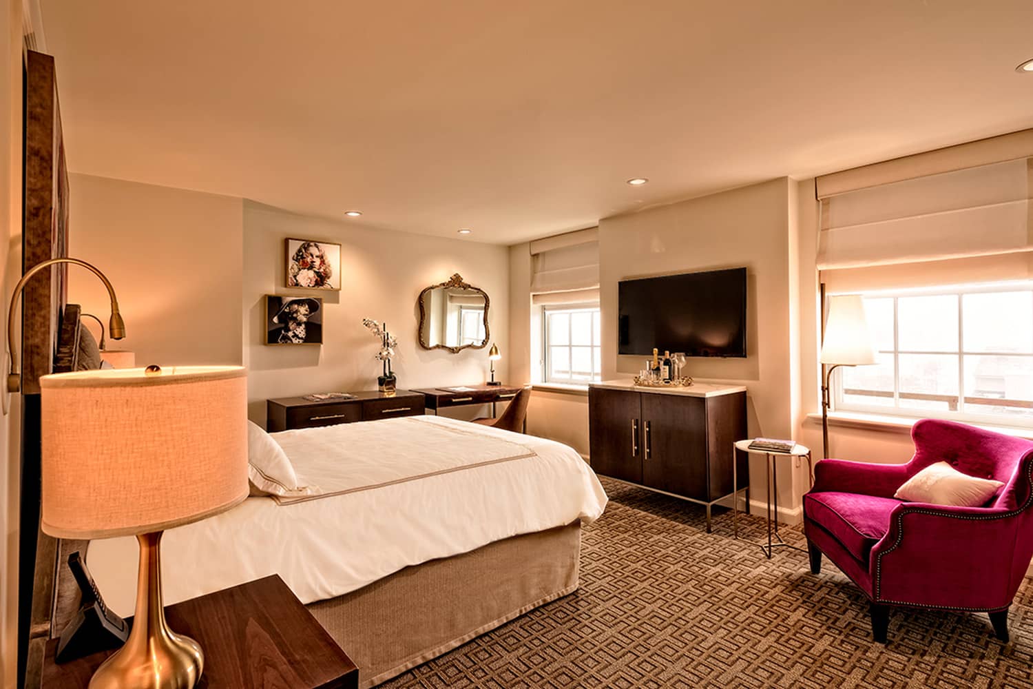 A deluxe guest room inside The Historic Cavalier Hotel