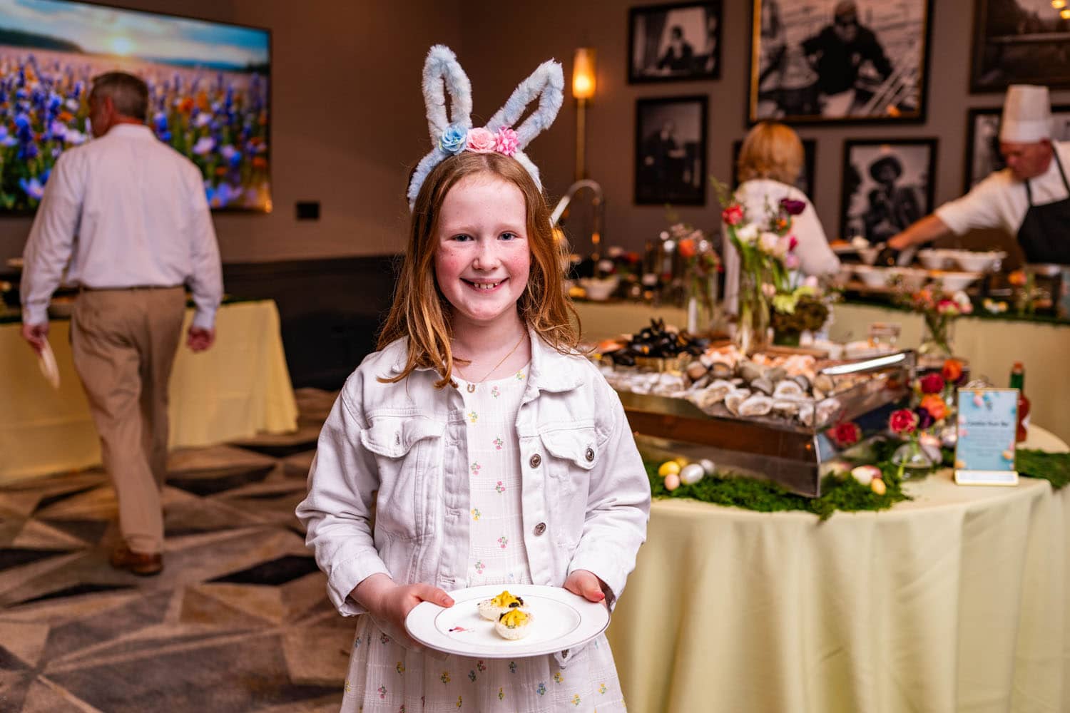 A child eating at the Easter buffet inside The Historic Cavalier Hotel