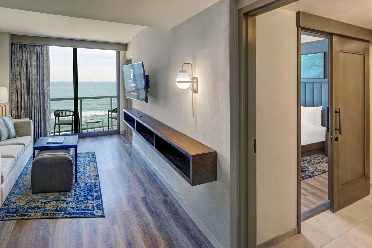 A king oceanfront two-room suite at the Embassy Suites Virginia Beach Oceanfront Resort