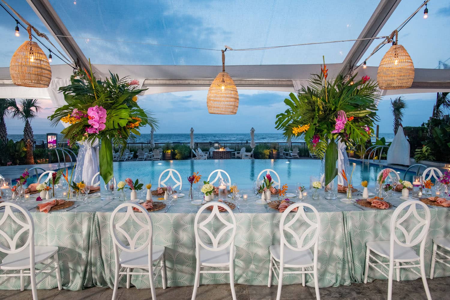The outdoor pool deck at the Embassy Suites Virginia Beach Oceanfront Resort setup for a tented event