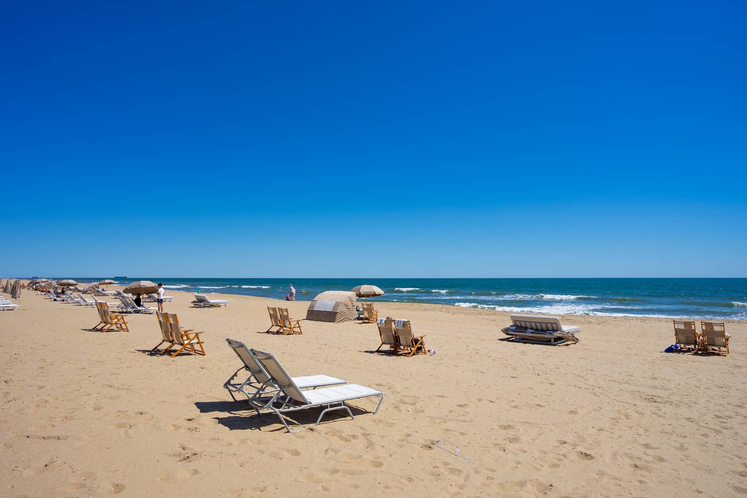Beach chairs and cabanas at the Cavalier Resort Virginia Beach