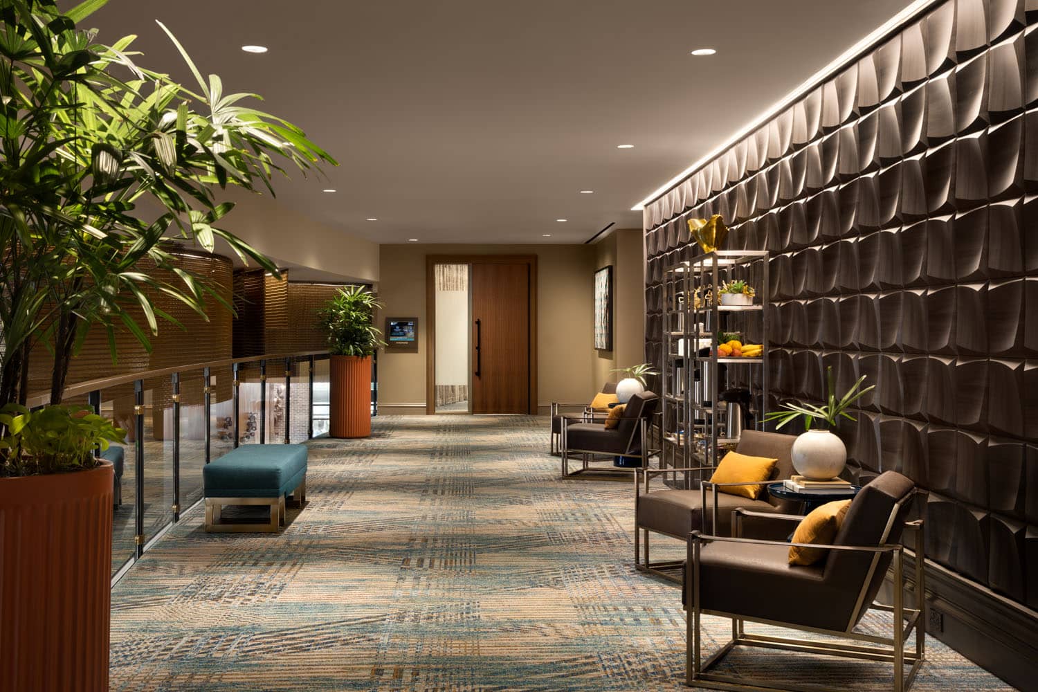 A meeting space area with comfy loungers inside the Embassy Suites Virginia Beach Oceanfront
